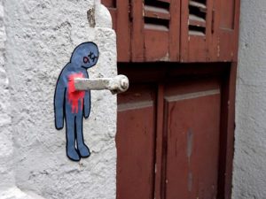 Street Art Example Nail through the Heart